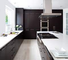 Four frosted glass uppers add a modern feel that helps open up the room with a reflective surface. 22 Beautiful Kitchen Colors With Dark Cabinets Home Design Lover