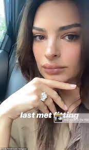 Emily ratajkowski shows off her engagement ring—and it's stunning. Emily Ratajkowski Packs On The Pda With Sebastian Bear Mcclard In Stomach Baring Top Daily Mail Online