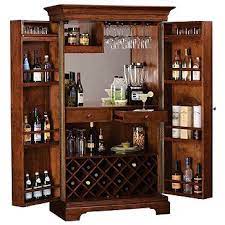 30 day return policy · lowest price guarantee · all orders ship free! Howard Miller Shiraz Hide A Bar Home Bar Cabinet Home Bar Furniture Wine Bar Cabinet