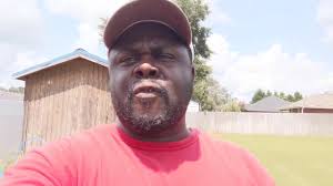 Cropping Collard Greens so others in the neighborhood can eat from the  garden too!