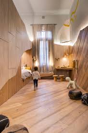 They are built in two levels with double bed design on the second level. This Fun And Unique Kids Room Draws Design Inspiration From A Bear Cave