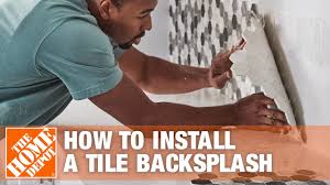 The person who came to our home to perform the measurements made a critical mistake as he put a seam over our dishwasher, where there is no underlying cabinet support for heavy stone. How To Install A Kitchen Tile Backsplash Kitchen The Home Depot Youtube