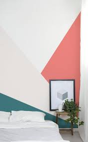 Blue accent wall, art on wall with wall sconces. 11 Creative Color Blocked Accent Wall Ideas To Try Color Block Accent Wall Color Block Wall Geometric Decor