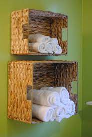 A simple towel hook or coat hook effortlessly takes the place of a towel bar. 23 Diy Bathroom Storage Ideas Towel Holders Racks And Hooks