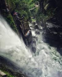 Those who arrive at the waterfall. Pailon Del Diablo Santa Cruz Ecuador Natural Landmarks