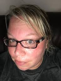 Young entrepreneur mowing lawns in neighborhood