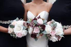 Dreamy, romantic and lovely, the bridal bouquet featuring blush ranunculus, tulips, roses, peonies or other beautiful flowers in season would suit perfectly a spring or summer bride. Burgundy Blush Pink Ivory And White Bridal Bouquets White Bridal Bouquet Autumn Bridal Bridal Bouquet