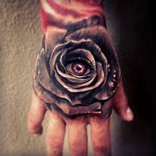 Rose Hand Tattoos Eye Rose Hand Tattoo Ink Rose Hand Tattoo Hand Tattoos For Guys Rose Tattoos