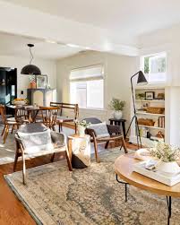 Creating a formal open living/dining room in a long, narrow space. Sara S Living Room Dining Room Reveal Emily Henderson