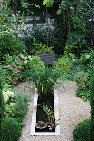Terrasse En Rez De Jardin A Paris 16 With Images Garden Pond Design Patio Garden Garden Design