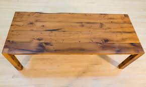 The long central brace at the bottom is tenoned through the leg and pinned with a large square pin. Reclaimed Oak Dining Table Re4med
