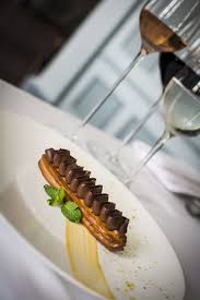 Chocolate Eclair By Le Planteur Restaurant And Lounge Frenchfood Dessert Chocolate Eclair Finedining Restaurant Eclairs Chocolate Eclair French Food