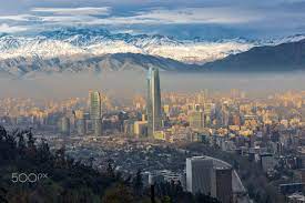 Santiago Santiago Chile S Capital And Largest City Sits In A Valley Surrounded By The Snow Capped Andes And The Chilean Co Santiago Chile Cityscape Santiago