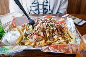 Fries, baked potatoe, mashed potatoes, scores rice or roasted vegetables. Where To Eat Gyro Poutine In Toronto