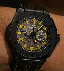 Hublot is the first brand to combine a specific metal case with a natural rubber strap. Hublot Big Bang Ferrari New Ceramic Titanium And Gold Watch Models For 2014 Hands On Ablogtowatch