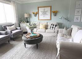 Blue couch grey walls living room. From Farmhouse To Modern Glam My Living Room Makeover With Article Sofa The Craft Patch