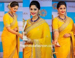 Srilekha reddy at marriage needs curtain raiser. Actress Surbhi In A Yellow Saree At Vasundhara Diamond Roof Launch