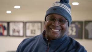 Jarrett Payton presents Chicago Bears defensive tackle Steve McMichael