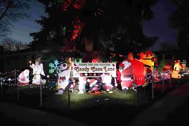 A neighborhood of holiday light displays that benefits the macc fund. A Milestone Moment Reached Thanks To Research And Candy Cane Lane Macc Fund