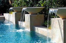 Pool water features, swimming pool fountains, swimming pool waterfall,. 3 Limestone Urn Fountains Spilling Into A Pool Swimming Pool Waterfall Swimming Pool Fountains Backyard Pool