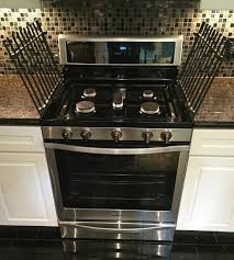 Whirlpool 5 8 Cu Ft Freestanding Gas Range With Center Oval Burner In Stainless Steel Wfg745h0fs The Home Depot Best Gas Stove Gas Range Modern Kitchen Pantry