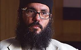 Free to walk London's streets, the extremist preacher and 'mentor' of  Jihadi John