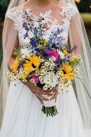 Any vibrant colour combination serves the purpose of bringing a contrast against the bride's white gown. Wildflower Bouquet Wildflower Wedding Bouquet Wildflower Wedding Flower Bouquet Wedding