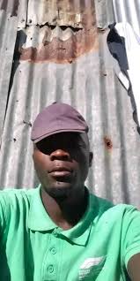 Julius Newton Eshitubi added a...