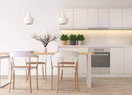 Another way to make your small kitchen look bigger is to replace your solid cabinet doors with glass ones. 9 Ways To Make Your Kitchen Look And Feel Bigger Bob Vila