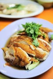 Place chicken in large stock pot and add rice wine, 2 tablespoons soy sauce, 2 teaspoons salt, white pepper, ginger, green onions, and pandan leaves (if using). Hainanese Delicacy Chicken Rice Far East Plaza Chicken Rice Recipes Chicken Rice Asian Recipes