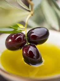 Dipping Olive Sprig With Black Olives In Olive Oil Photographic Print Allposters Com In 2020 Olive Food Fruit