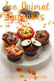 Top tip for making animal cupcakes. Zoo Animal Cupcakes Tutorial The Busy Baker