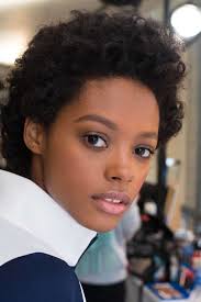 If you're looking to hide the narrow look of your face shape, a layered bang helps conceal it in a stylish way. Oval Faces Top 5 Short Haircuts For Curly Hair