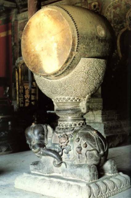 Elephant-skin drum with stone base inside Longguodian (Hall of Dynastic Prosperity) | Project Himalayan Art