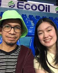 UST high school and Philippine national volleyball player Jai Adrao, caught  her watching NCAA99 college volleyball.