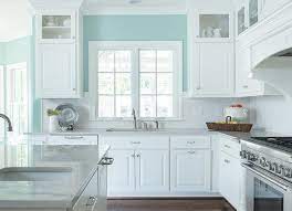 This turquoise kitchen features an airy feel thanks to its many windows and the white hardwood floors, painted in mountain peak white by benjamin moore. Turquoise Kitchen Walls Transitional Kitchen Blue Kitchen Walls Kitchen Design Kitchen Design Small