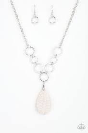 Most commonly, it has a center stone surrounded by two side stones, which can be smaller or the same size. Paparazzi Livin On A Prairie White Teardrop Stone Silver Ring Neckla