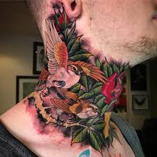 Men and women both likes to get tattoos. Cool Two Flying Birds With Roses Tattoo On Man Right Side Neck
