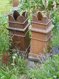 Pin By Emma Batchelor On A Place To Take Root Backyard Fireplace Garden Urns Gorgeous Gardens