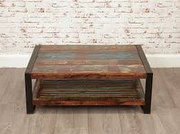 A living room with a sofa and no coffee table is like lord of the rings with frodo and no samwise gamgee. Urban Chic Large Rectangular Open Coffee Table With Shelf