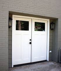 Double Door Garage Conversion Replace An Overhead Door With Pre Hung Double Panels Conversion Doubledoor In 2020 Garage Door Design Double Garage Door Garage Doors