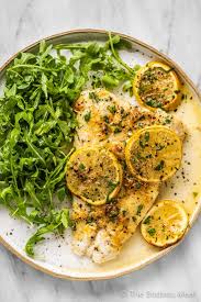 Baked Fish With Lemon Garlic Butter Sauce Recipe White Fish Recipes Baked Lingcod Recipe Baked Fish