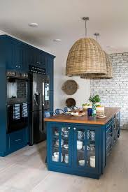 I am totally a white and pastel kind of person. To Add Distinctive Style And Personality The Kitchen At Hgtv Urban Oasis 2017 Focuses On Eye C Outdoor Kitchen Design Blue Kitchen Cabinets Home Decor Kitchen