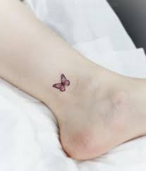 20 Charming Butterfly Tattoos Derelictattoo A Site That Will Rule All Tattoos Creative Tattoos Tiny Butterfly Tattoo Butterfly Tattoo