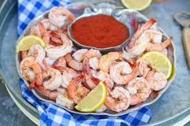 Place a layer of ice on the bottom of a deep serving tray and place shredded lettuce or. How To Boil Shrimp For Shrimp Cocktail A Fork S Tale
