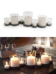 Pillar candle holders are available in hurricane holders, pillar plates, mirror plates and cylinder holders. Bubbles Glass Iron Multiple Candle Holder Multiple Candle Holder Glass Candle Holders Candle Holders