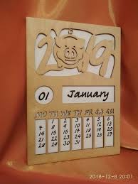 2019 Wooden Wall Calendar With The Image Symbol 2019 Year Of The Pig Original Design Unique New Ye Wall Calendar Design Calendar Holder Wall Calendar