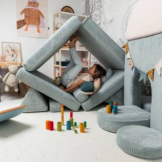 Modular foam cushions configured as a play fort, AI generated
