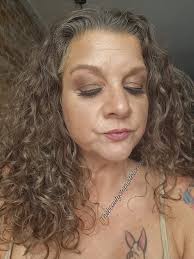 Getting dressed in my new outfit and taking a selfie