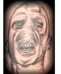 Black Ink Harry Potter Enemy Face Tattoo Design Harry Potter Tattoo Sleeve Harry Potter Tattoo Small Face Tattoo